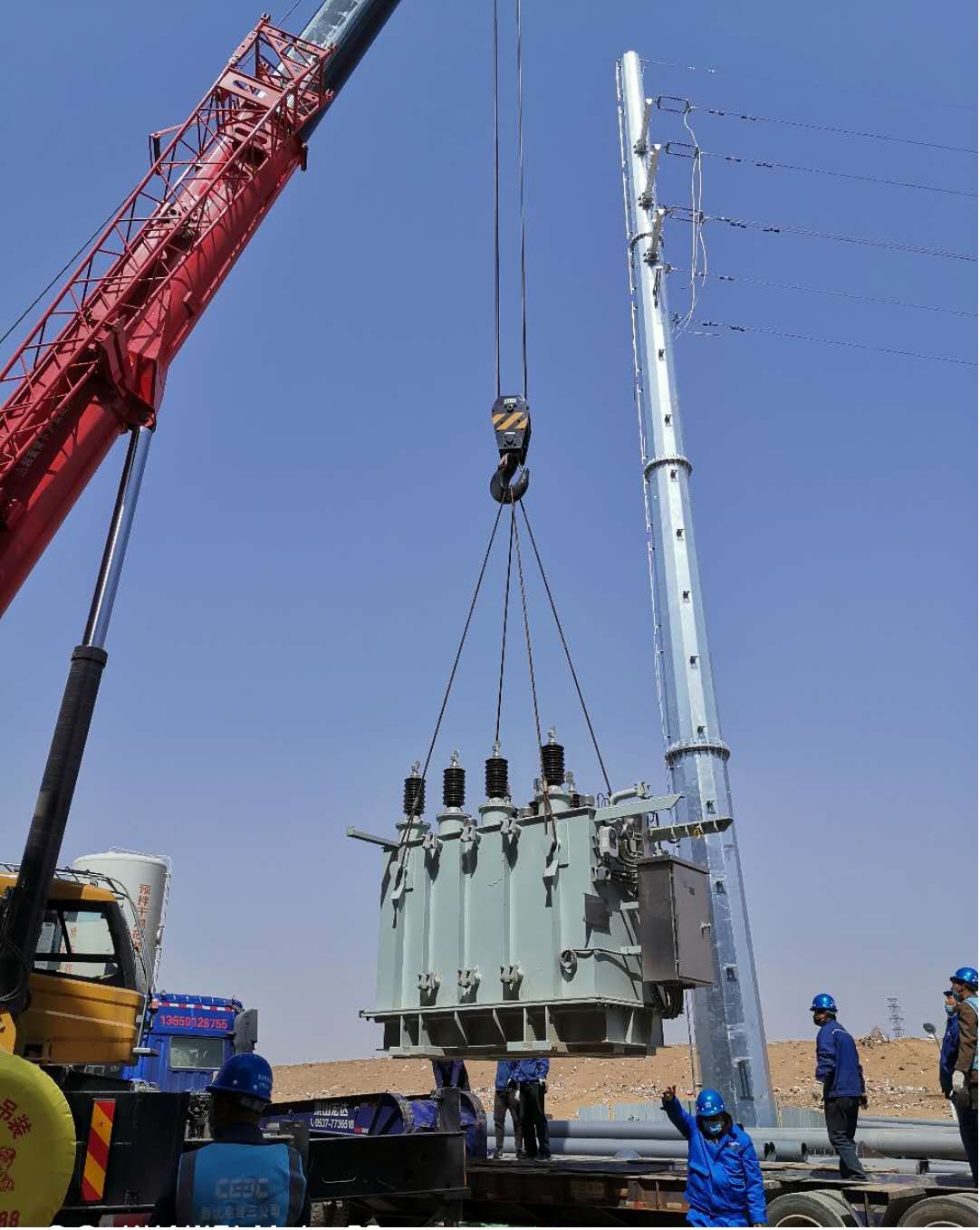 國源公司榆林生活垃圾發(fā)電項目主變壓器成功就位 (1).jpg